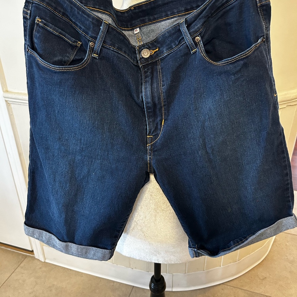 Levi’s Classic Mid-Rise Bermuda Shorts-“Cast Shadows “ Dark Wash/Woman’s 33/16